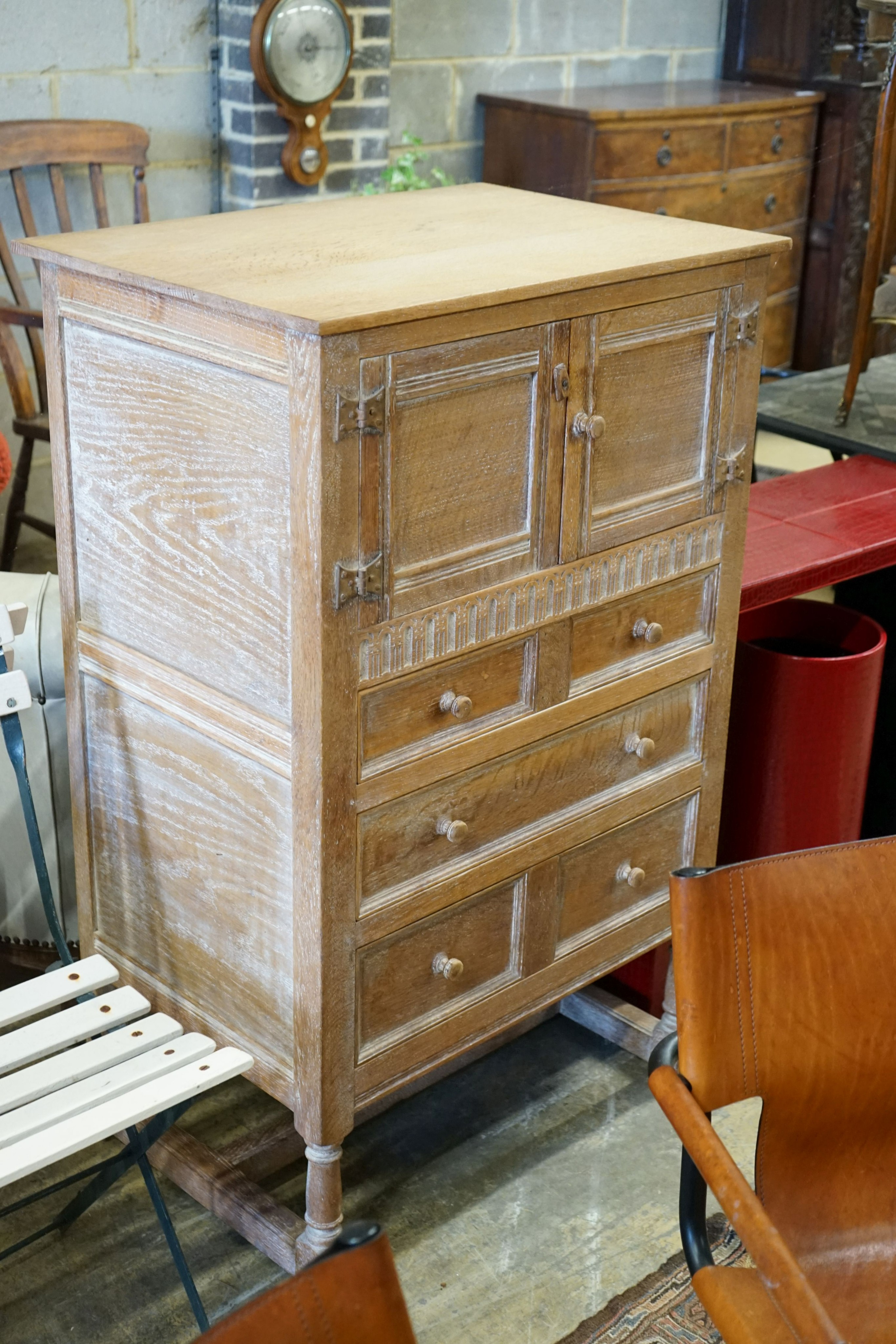 A Heals limed oak chest of drawers, dressing table, width 114cm, depth 51cm, height 135cm and a stool